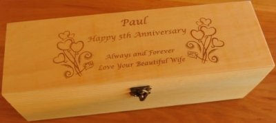 Pine wine bottle box engraved with bunch hearts and text for anniversay