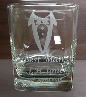 Whisky glass with bow tie engraving