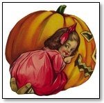 Halloween girl with red bow kneeling next to punmkin 187