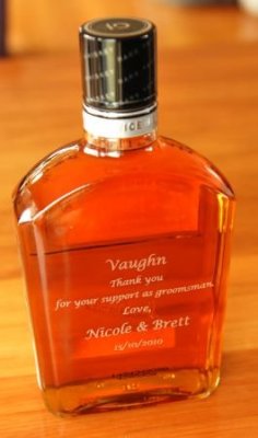 Flat engraved bottle