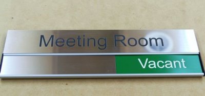 Meeting room header with room status slider